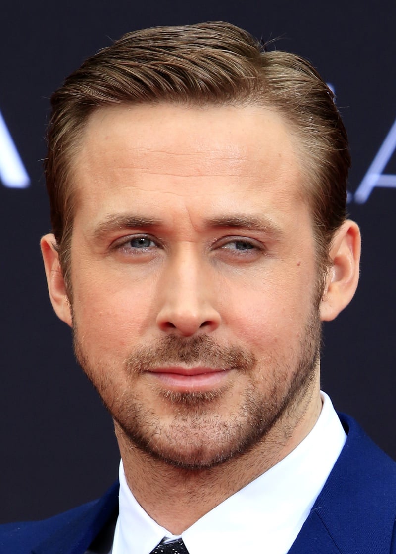 Ryan Gosling's classic side-parted Ivy League haircut with closely cropped tapered sides and polished voluminous top, 2016