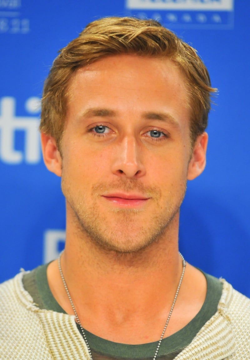 Ryan Gosling's short, textured hairstyle with closely cropped sides and a side-swept, tousled top
