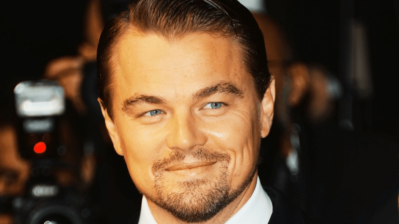 Leonardo DiCaprio on the red carpet with short side-swept hair and subtle volume, Once Upon a Time in Hollywood era
