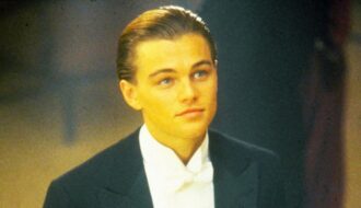 Leonardo DiCaprio with sleek side-parted slicked back hairstyle at formal event, modern era