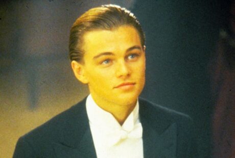 Leonardo DiCaprio with sleek side-parted slicked back hairstyle at formal event, modern era