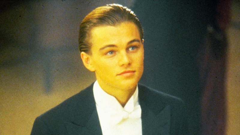 Leonardo DiCaprio with sleek side-parted slicked back hairstyle at formal event, modern era