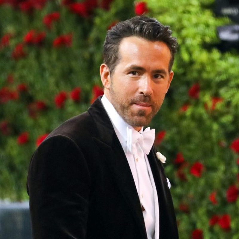 Ryan Reynolds Ivy League haircut front view showing short tapered sides with textured top styled forward