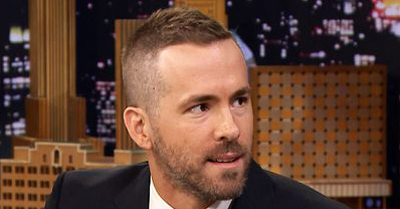 Ryan Reynolds' short neatly styled haircut with closely cropped sides and textured top as Wade Wilson in Deadpool
