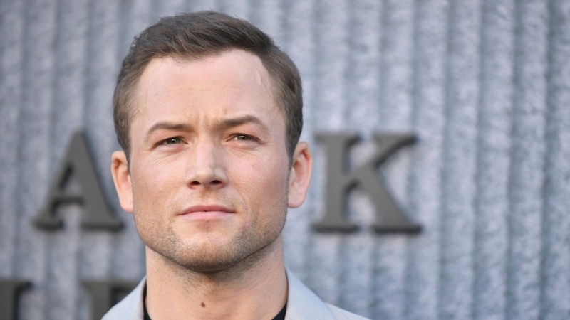 Taron Egerton crew cut with widow's peak, his low-maintenance off-duty look